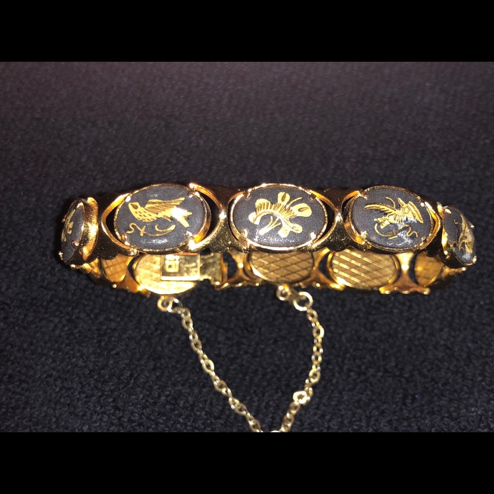 Unique Bracelet with Birds and Flowers Motifs.